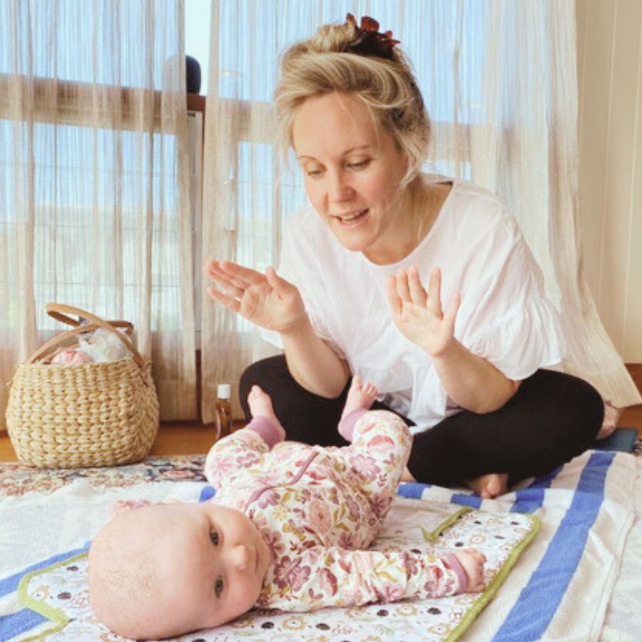 mum-giving-baby-girl-a-massage.png